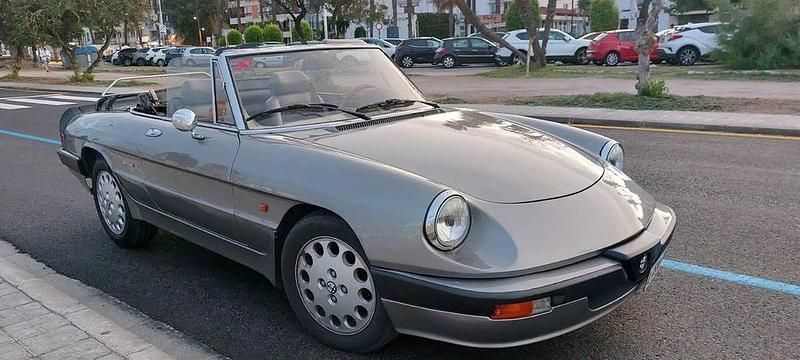 Grau Gebraucht 1987 Alfa Romeo Spider Quadrifoglio Cabrio | 11.485 € - Bild 1/4