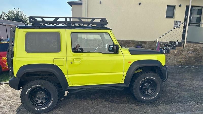 Gelb Gebraucht 2020 Suzuki Jimny Comfort+ SUV | 31.500 € (Fairer Preis) - Bild 1/4
