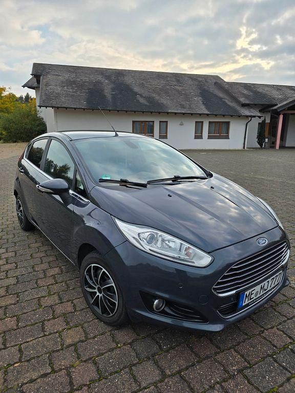Blau Gebraucht 2014 Ford Fiesta Individual Limousine | 3.900 € - Bild 1/4