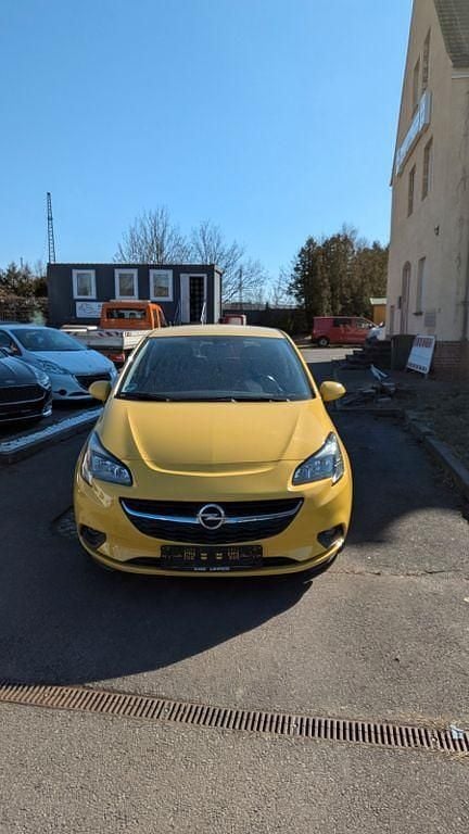 Second-hand Opel Corsa drive 90 CP (66 kW) 2015 Galben Hatchback