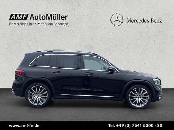 Lack kosmosschwarz Gebraucht 2021 Mercedes GLB200 AMG line SUV | 33.865 € (Fairer Preis) - Bild 1/4