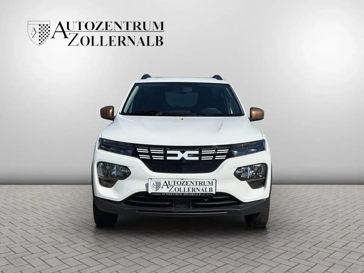 Gebraucht Dacia Spring Extreme 66 kW (90 PS) 2023 Weiß Kleinwagen