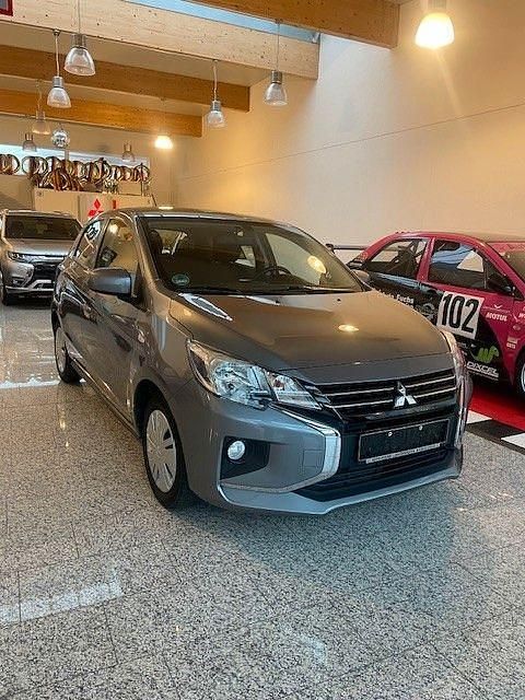 Grau Gebraucht 2021 Mitsubishi Space Star Spirit Limousine | 8.490 € (Guter Preis) - Bild 1/4