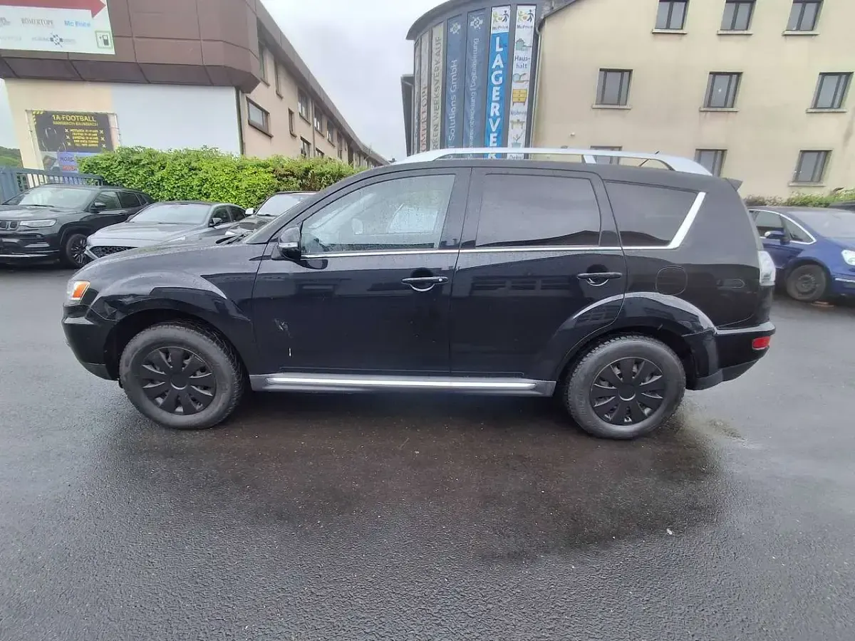 Gebraucht Mitsubishi Outlander Invite 147 PS (108 kW) 2010 Pantherschwarz (p) SUV