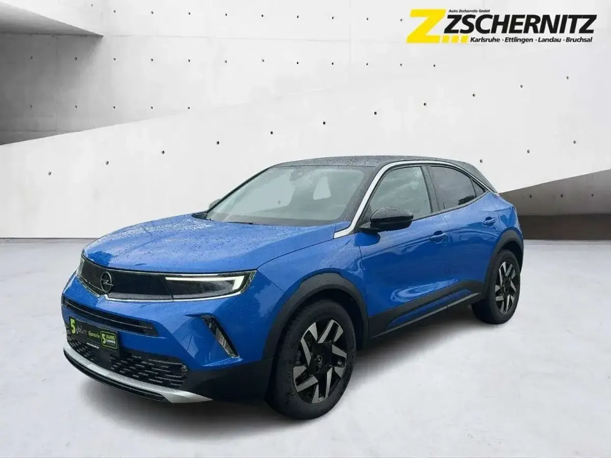Gebraucht Opel Mokka-e Elegance 100 kW (136 PS) 2022 Perl blau/voltaik blau SUV
