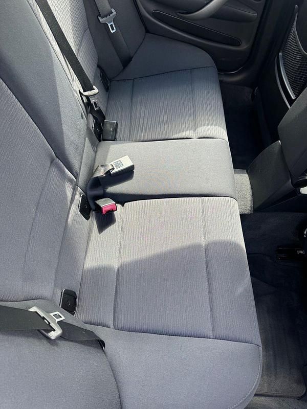 Gebraucht BMW 116 122 PS (89 kW) 2009 Schwarz Kleinwagen