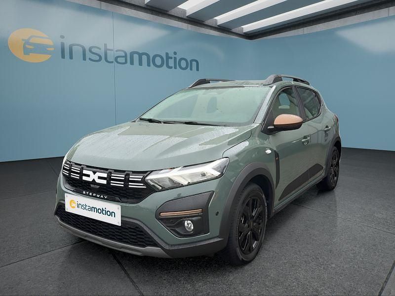 Grün Gebraucht 2024 Dacia Sandero Stepway Kleinwagen | 18.499 € (Fairer Preis) - Bild 1/4