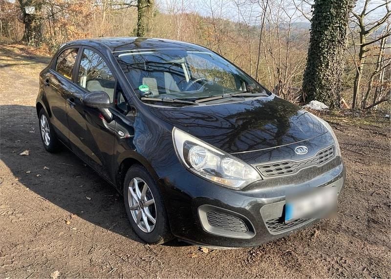 Gebraucht Kia Rio 109 PS (80 kW) 2011 Schwarz Kleinwagen
