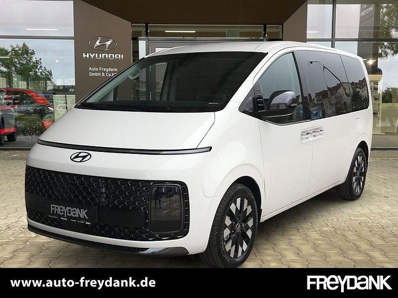 Creamy white Neu 2025 Hyundai Staria Van | 53.999 € - Bild 1/4