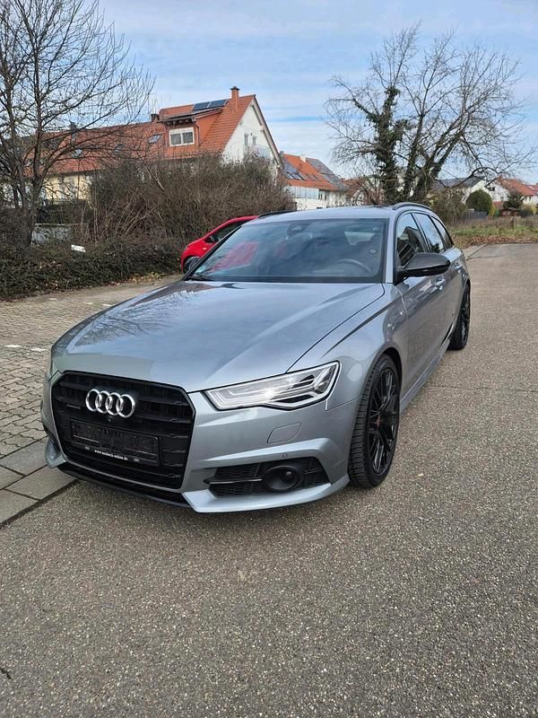 Second-hand Audi A6 Black Edition 320 CP (235 kW) 2018 Andere farben Break