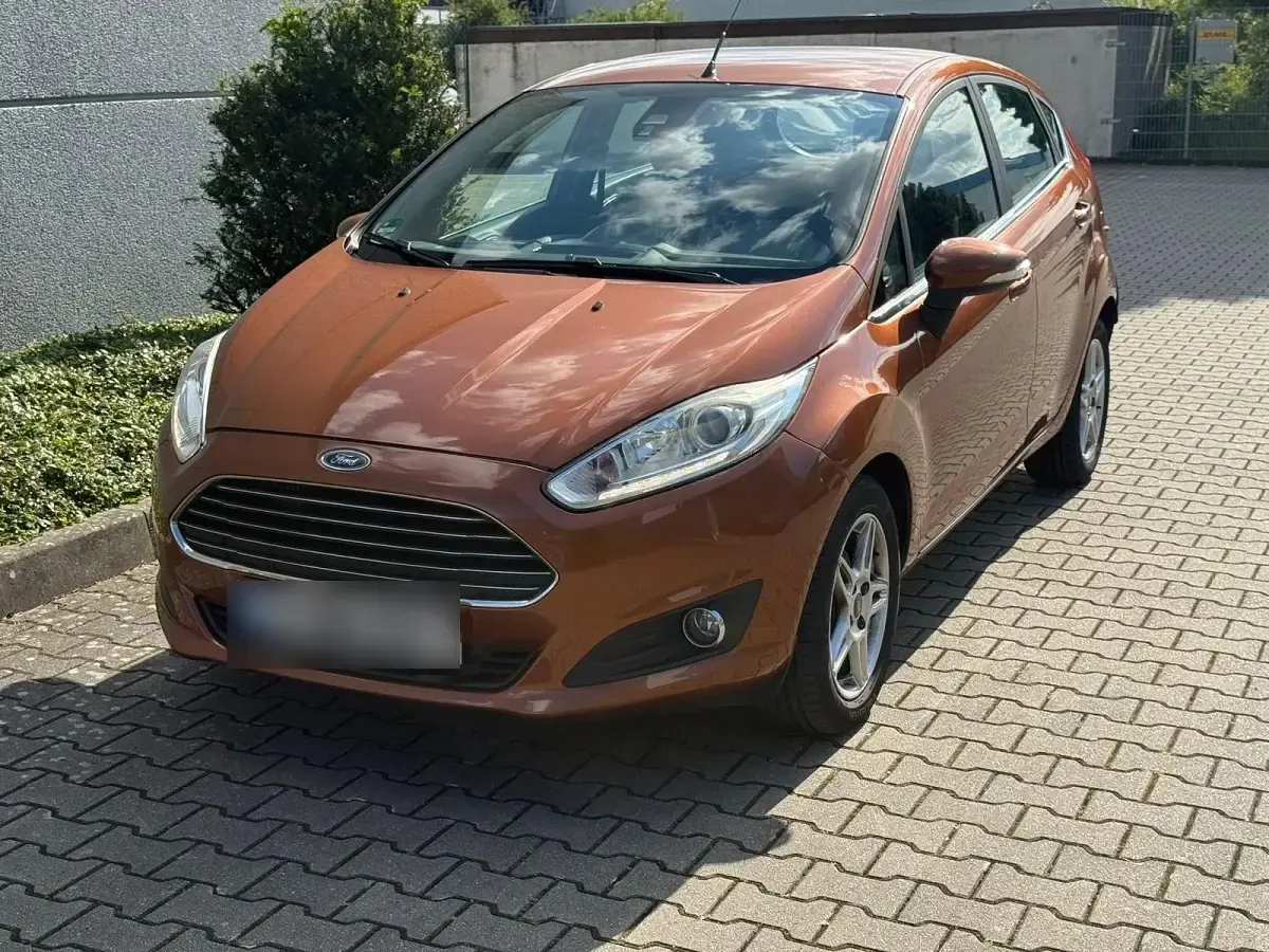 Gebraucht Ford Fiesta 95 PS (69 kW) 2014 Orange Kleinwagen