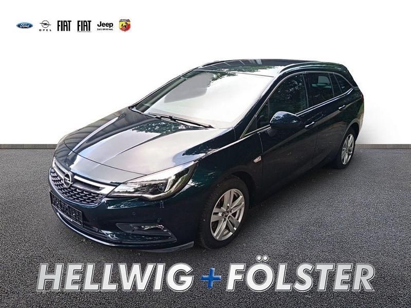 Grün Gebraucht 2018 Opel Astra Dynamic Kombi | 12.450 € (Fairer Preis) - Bild 1/4