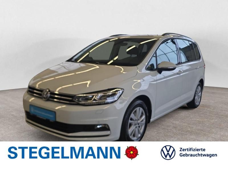 Pure white Gebraucht 2020 VW Touran Comfortline Van / Kleinbus | 26.910 € (Fairer Preis) - Bild 1/4