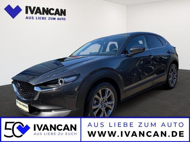 Grau (machine gray) Neu 2024 Mazda CX-30 Exclusive-Line SUV | 32.150 € - Bild 1/2