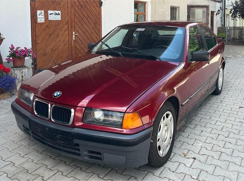Rot Gebraucht 1991 BMW 316 Limousine | 1.100 € - Bild 1/4