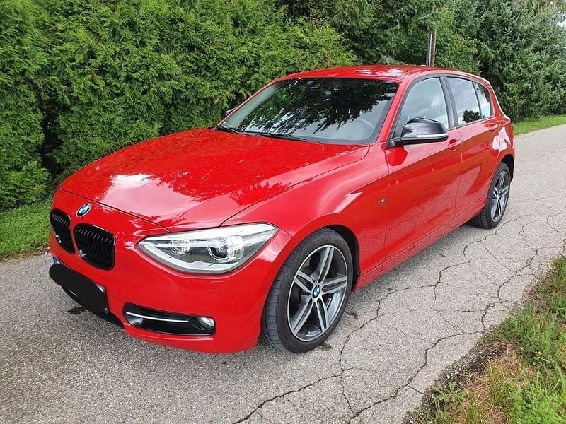 Rot Gebraucht 2011 BMW 118 Sport Line Kleinwagen | 8.800 € (Fairer Preis) - Bild 1/4