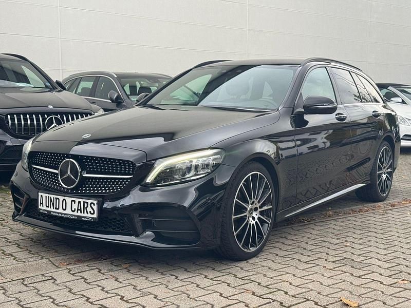 Schwarz Gebraucht 2018 Mercedes C220 AMG line Kombi | 25.999 € (Teuer) - Bild 1/4