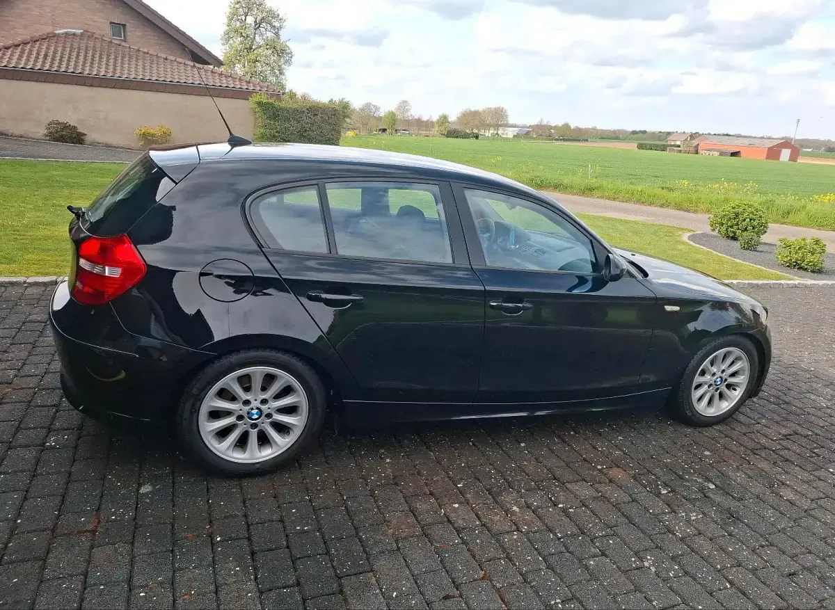 Używany BMW 116 122 KM (89 kW) 2008 Czarny Hatchback
