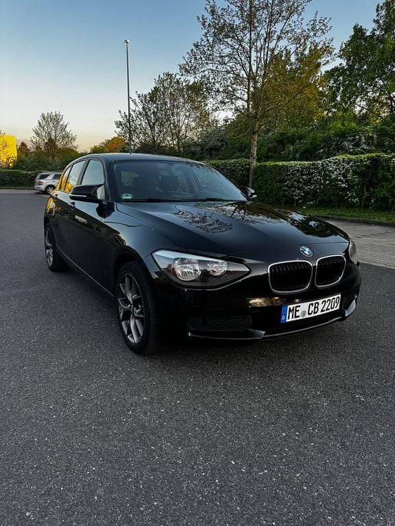 Second-hand BMW 114 102 CP (75 kW) 2014 Negru Hatchback