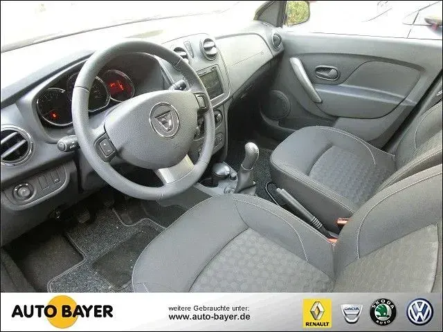 Gebraucht Dacia Sandero Lauréate 90 PS (66 kW) 2013 Blau metallic Kleinwagen