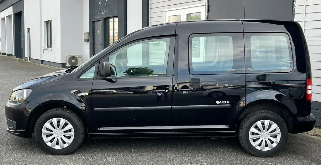 Usado VW Caddy 105 HP (77 kW) 2013 Preto Monovolume