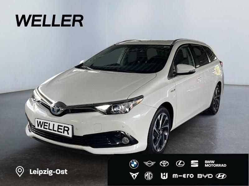 Weiss Gebraucht 2016 Toyota Auris Hybrid Design Kombi | 15.990 € (Fairer Preis) - Bild 1/3