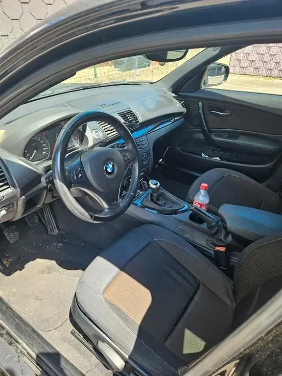 Gebraucht BMW 116 116 PS (85 kW) 2010 Schwarz Kleinwagen