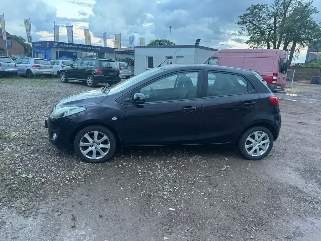 Gebraucht Mazda 2 Active 84 PS (61 kW) 2011 Schwarz Kleinwagen
