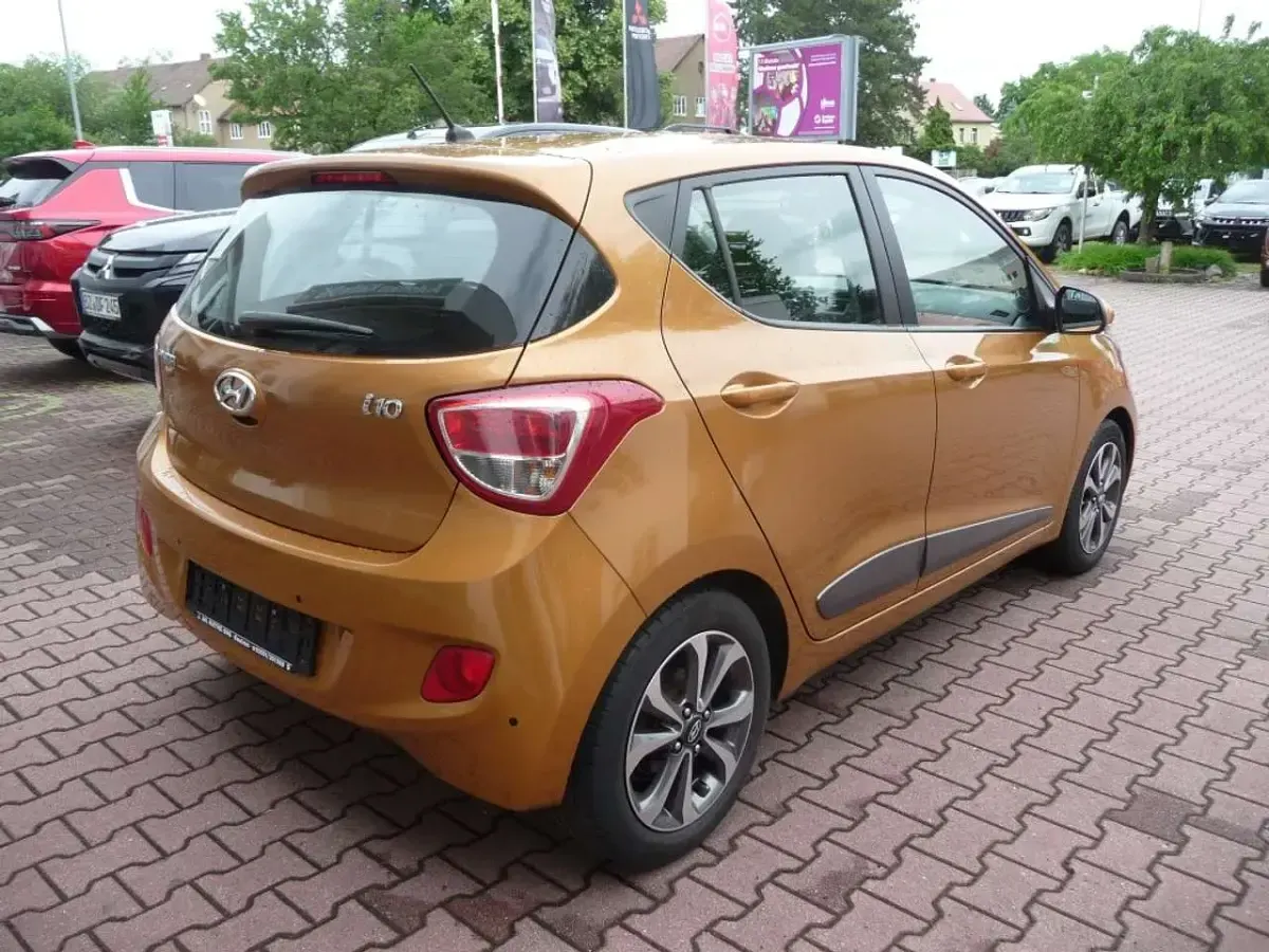 Gebraucht Hyundai i10 Style 87 PS (63 kW) 2016 Orange Kleinwagen