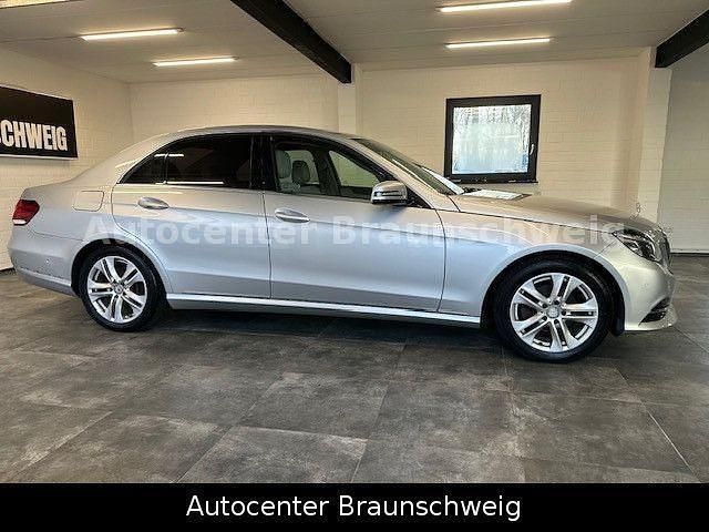Second-hand Mercedes E200 136 CP (100 kW) 2013 Argintiu Berlinǎ