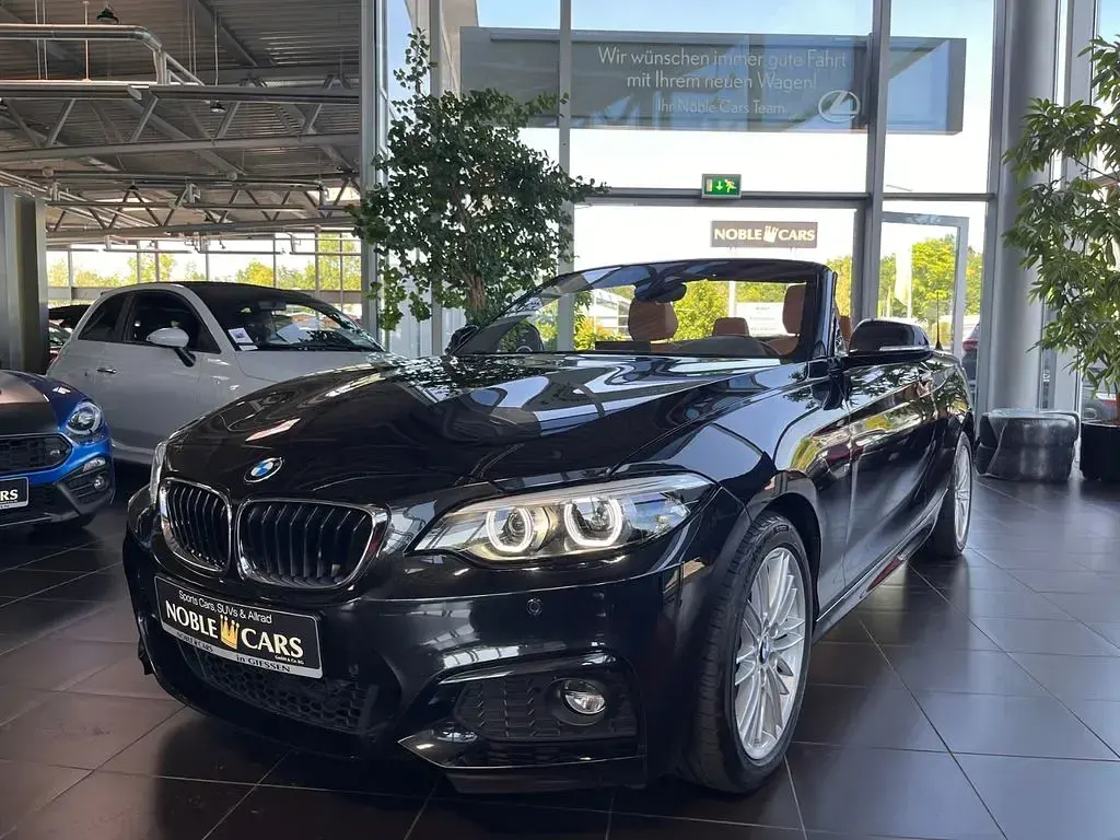 Gebraucht BMW 220 M Sport 184 PS (135 kW) 2018 Black sapphire metallic (metallic) Cabrio