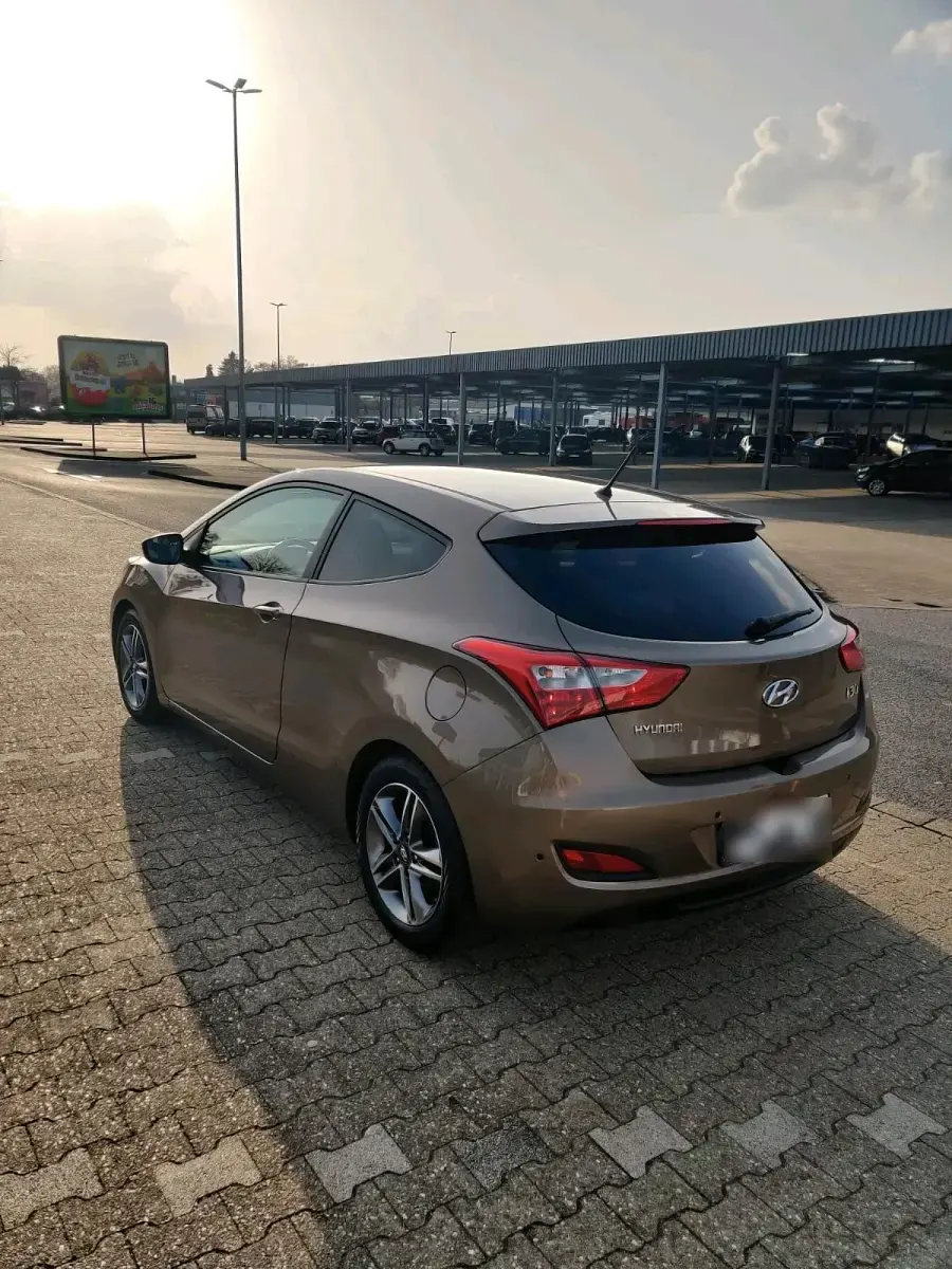Gebraucht Hyundai Coupé 135 PS (99 kW) 2014 Braun Coupé