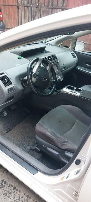 Grau Gebraucht 2012 Toyota Prius+ Van / Kleinbus | 10.900 € (Etwas zu teuer) - Bild 1/2