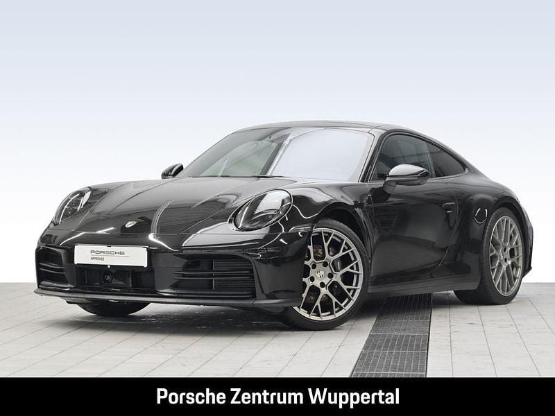 Schwarz Gebraucht 2024 Porsche 911 Carrera Coupé | 132.640 € (Guter Preis) - Bild 1/4