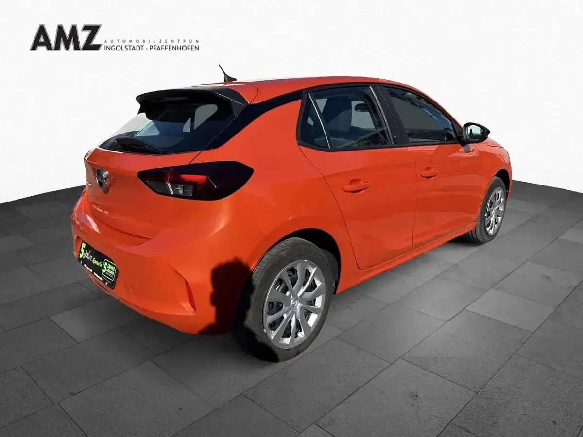 Gebraucht Opel Corsa-e Edition 100 kW (136 PS) 2023 Power orange/dynamik orange Kleinwagen
