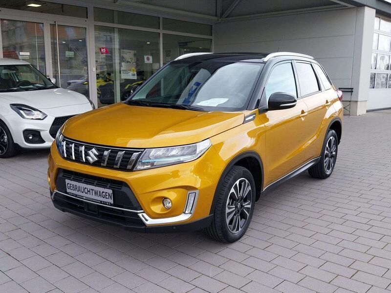 Solar yellow cosmic black Gebraucht 2022 Suzuki Vitara Comfort+ SUV | 23.990 € (Fairer Preis) - Bild 1/4