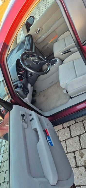 Second-hand Audi A2 110 CP (80 kW) 2003 Roșu Hatchback