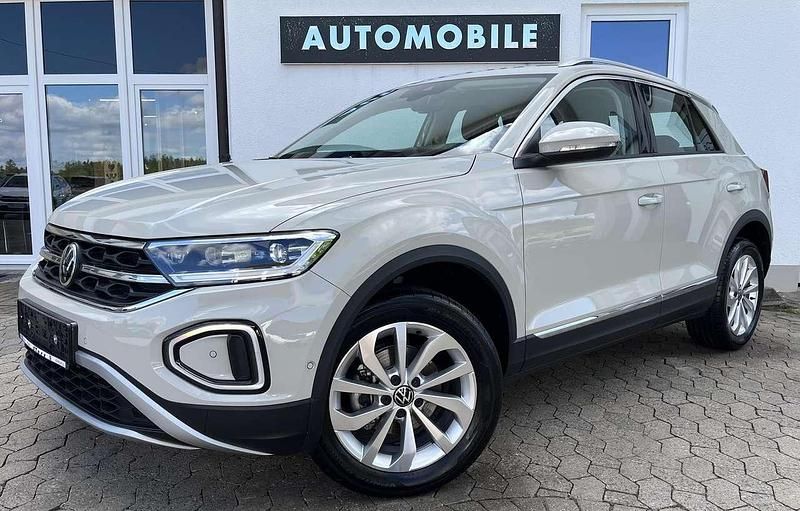 Ascotgrau Gebraucht 2024 VW T-Roc Style SUV | 29.979 € (Fairer Preis) - Bild 1/4