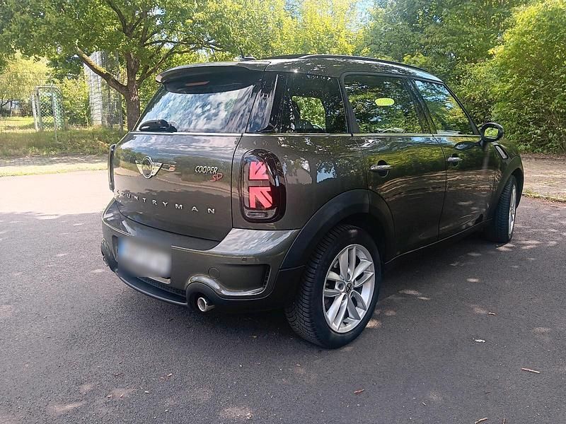 Grau Gebraucht 2012 Mini Countryman SUV | 12.900 € - Bild 1/4