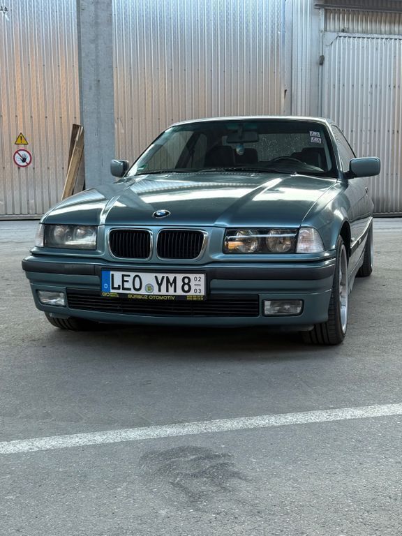 Grün Gebraucht 1997 BMW 320 Sport Line Coupé | 6.699 € (Fairer Preis) - Bild 1/4