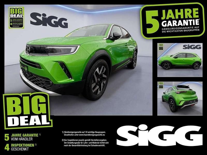 Matcha green/ikone gruen (metallic) Gebraucht 2022 Opel Mokka-e Elegance SUV | 17.980 € (Fairer Preis) - Bild 1/4
