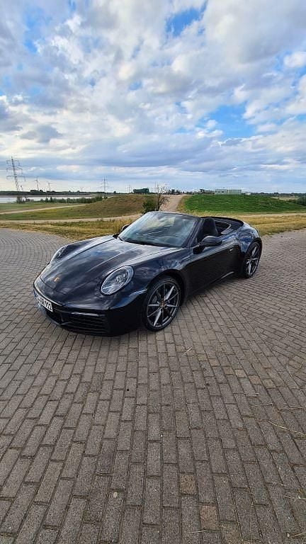 Schwarz Gebraucht 2022 Porsche 911 Carrera Cabriolet Cabrio | 129.000 € (Fairer Preis) - Bild 1/4
