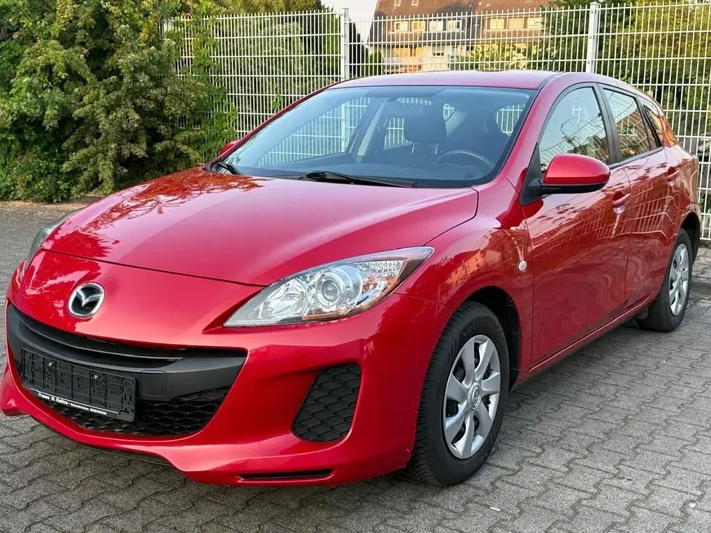 Używany Mazda 3 Active 105 KM (77 kW) 2013 Czerwony Sedan/Limuzyna