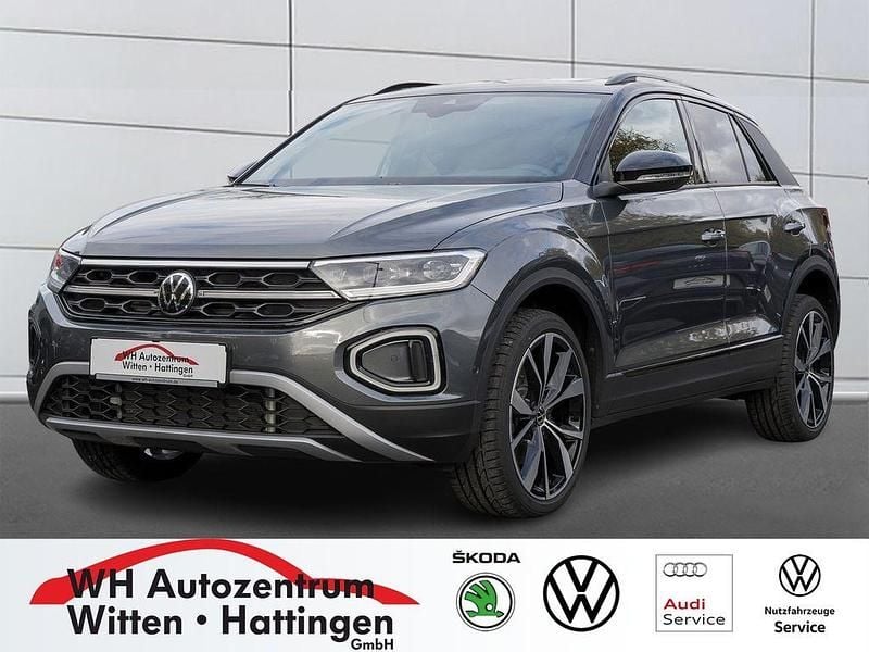 Indiumgrau metallic Gebraucht 2025 VW T-Roc Style SUV | 31.924 € (Guter Preis) - Bild 1/4