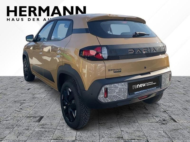 Gebraucht Dacia Spring Extreme 47 kW (65 PS) 2024 Safaribeige (beige) Kleinwagen