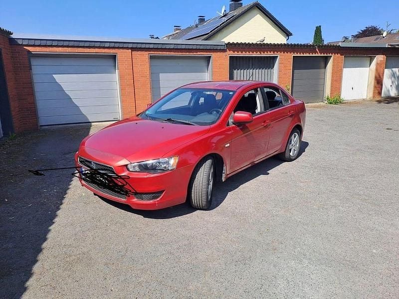 Gebraucht Mitsubishi Lancer 117 PS (86 kW) 2010 Rot Limousine