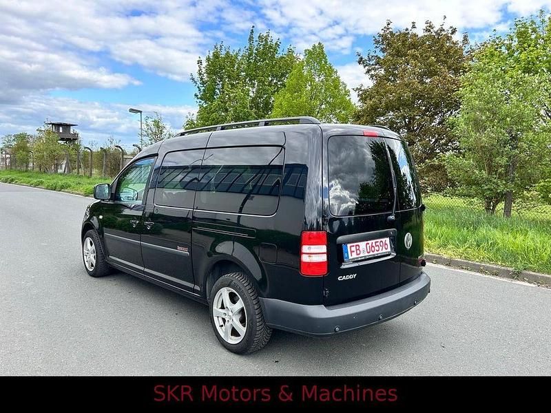 Second-hand VW Caddy 109 CP (80 kW) 2011 Negru Monovolum