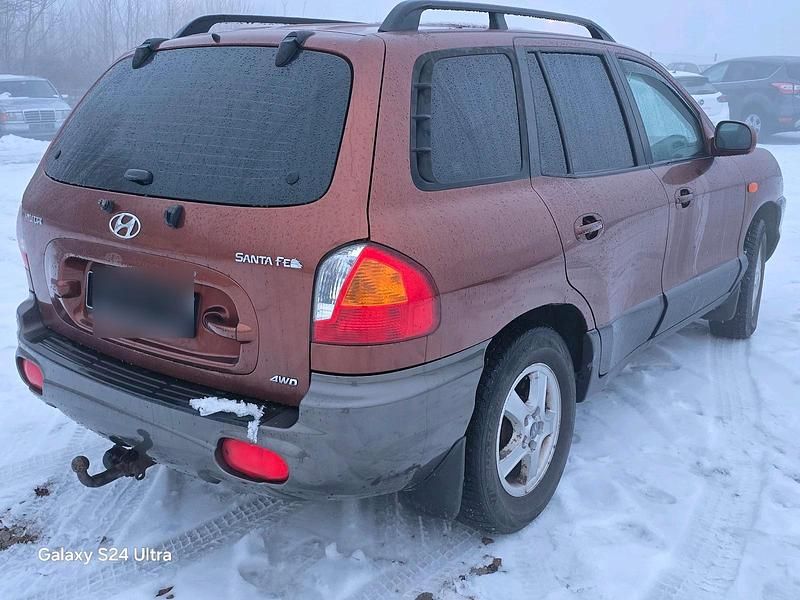 Gebraucht Hyundai Santa Fe 147 PS (108 kW) 2001 Orange SUV