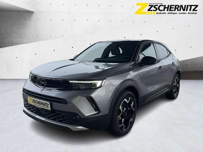 Kontrast grau/quarz silber Gebraucht 2023 Opel Mokka-e Ultimate SUV | 20.960 € (Fairer Preis) - Bild 1/4