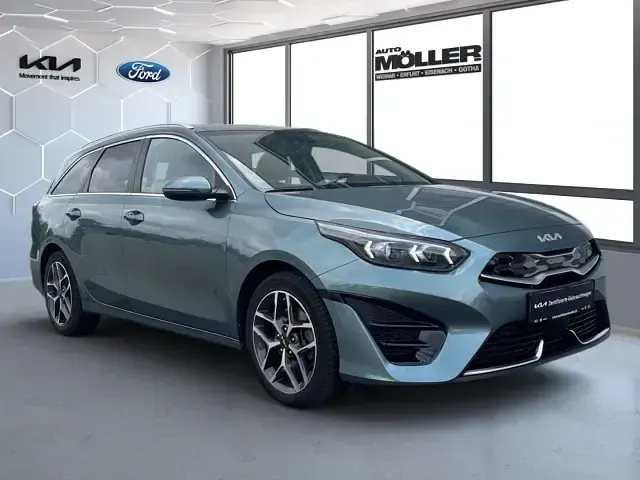 Gebraucht Kia Ceed Sportswagon Platinum 141 PS (103 kW) 2023 Usg) yucca stahlgrau met. (grau Kombi